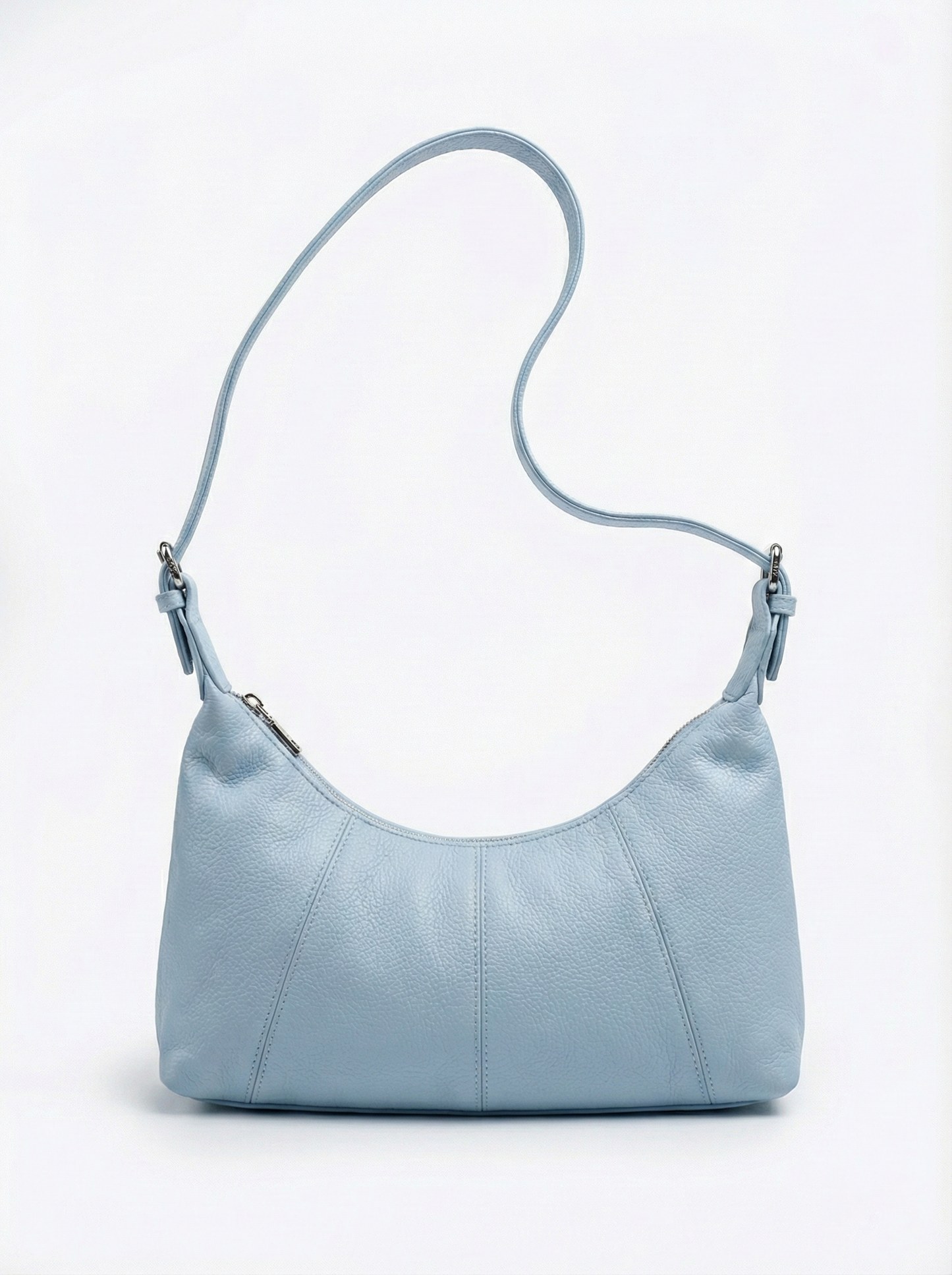 light blue handbag with a strap on a white background