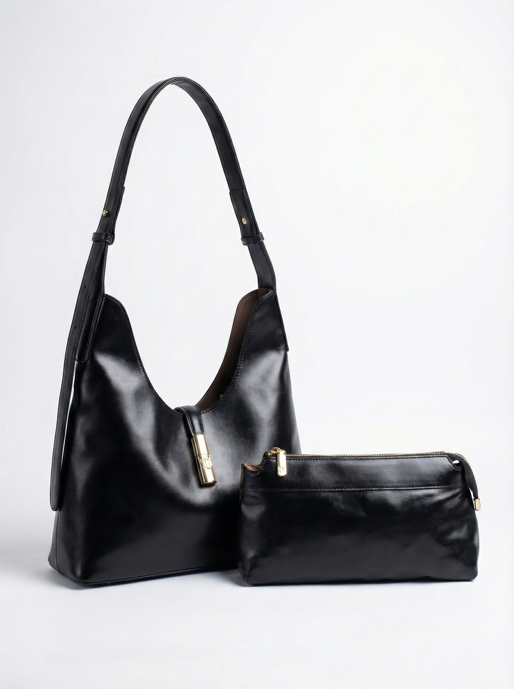 Classic Black Convertible Hobo Bag with Gold Accent
